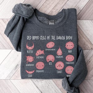 Hematology Sweatshirt | Red Blood Cell Shirt | Red Blood Cells of the Human Body | Biology Cells at Work | Medical Laboratory Scientist