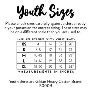 May include: A black and white sizing chart for youth shirts labeled Youth Sizes. The table lists label sizes XS through XL with corresponding fit sizes, widths, chest measurements, and lengths in inches. It notes the Gildan Heavy Cotton 5000B brand.
