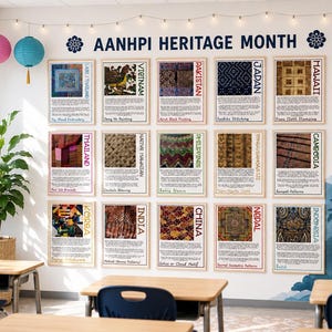 May include: A wall display titled AANHPI HERITAGE MONTH featuring fifteen framed educational posters. Each poster showcases a specific cultural textile or art form from various Asian and Pacific Islander regions, including text descriptions and imagery.