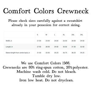 May include: A size chart for a Comfort Colors crewneck sweatshirt. The table lists width, length, and sleeve length in inches for sizes S through 3XL. It specifies the garment is 80% ring-spun cotton and 20% polyester, with care instructions.
