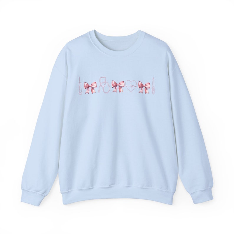 Coquette Nurse Sweatshirt | Cute RN Shirt, Pediatric, NICU, Icu, ER Graduation Gift Sweater, Nurse Practitioner, Labor Delivery, Mother Baby Light Blue