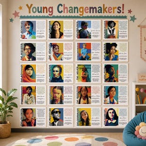 May include: A wall display featuring portraits of young changemakers. The portraits are arranged in rows and columns, each accompanied by text. The words "Young Changemakers" are displayed at the top. A banner with the words "Be kind. Be you." hangs on the wall.