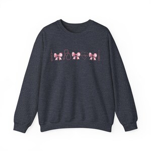 Coquette Nurse Sweatshirt | Cute RN Shirt, Pediatric, NICU, Icu, ER Graduation Gift Sweater, Nurse Practitioner, Labor Delivery, Mother Baby Heather Sport Dark Navy