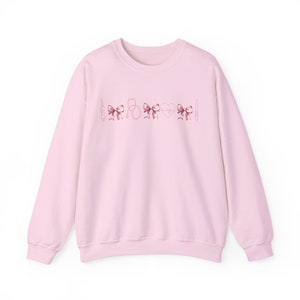 Coquette Nurse Sweatshirt | Cute RN Shirt, Pediatric, NICU, Icu, ER Graduation Gift Sweater, Nurse Practitioner, Labor Delivery, Mother Baby Light Pink