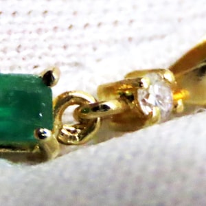 18k gold necklace with natural emerald and diamonds