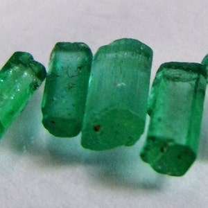 Hexagonal emerald crystal. Rough, untreated, clean and of good color