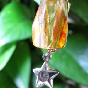 Young amber (Copal) pendant in silver