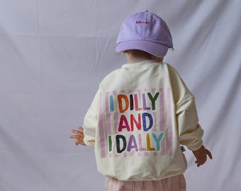 Sudadera extragrande "I Dilly and I Dally" | Tallas 62/68 - 122/128 | Suéter de verano | Amarillo pastel | Estampado en la espalda | Suéter para niños/bebés