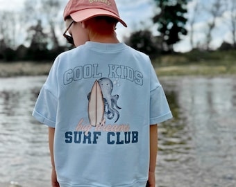 Camiseta infantil extragrande "COOL KIDS" en azul claro | Camiseta de verano para bebés y niños | Tallas de la 62 a la 128 | Camiseta moderna con estampado en la espalda o en la parte delantera