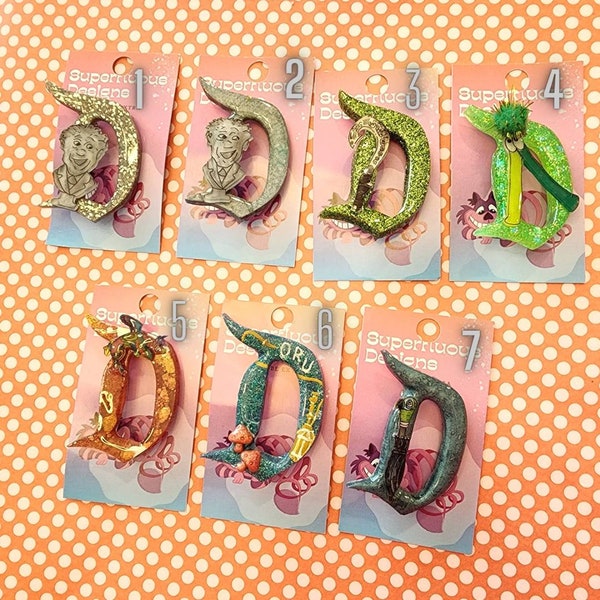 Character D Brooches