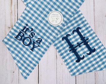 It’s a Boy | Baby Gender Reveal | Light Blue Gingham Plaid Check | Classic Embroidered Wreath Sash | Personalized | Monogrammed | Cotton