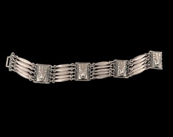 Taxco Mexican bracelet, made in 1940s, sterling silver with Aztec/Mayan faces, vintage Taxco Mexico silver