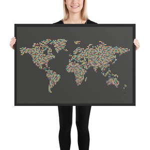 May include: A framed world map print with a black frame. The map is made up of colorful dots on a dark gray background.