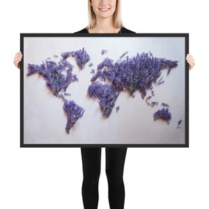May include: A world map made of lavender flowers on a white background. The map is framed in black.
