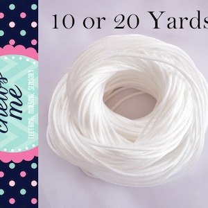 May include: White cord for crafting, available in 10 or 20 yard lengths.  The cord is wound into a coil.