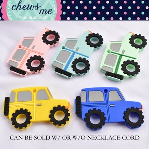 May include: Five silicone teethers shaped like toy trucks in pink, blue, green, yellow, and light blue. The teethers have black wheels and are designed for babies to chew on.