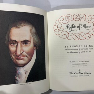 Puede incluir: Libro abierto con un retrato de Thomas Paine a la izquierda y el t&iacute;tulo "Rights of Man" a la derecha. Es una edici&oacute;n de coleccionista de The Easton Press, encuadernada en cuero genuino.