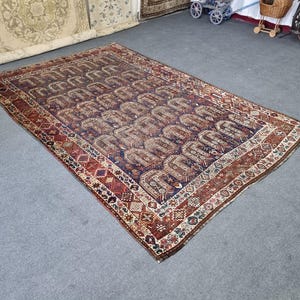 Antique Persian Shiraz Wool Rug (6.6x9.6 ft)