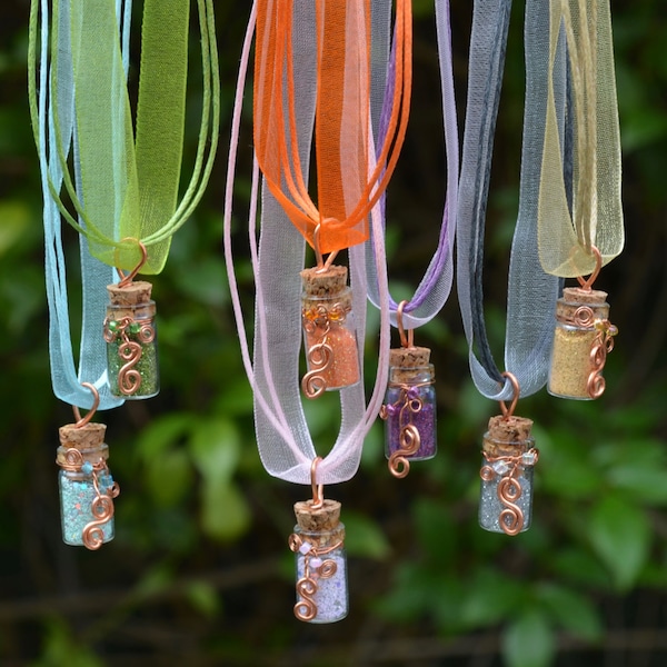 Free Range Montana Pixie Dust! Access the powers of nature with an elemental Pixie Dust Pendant / Necklace! Choose one of 7 colors!