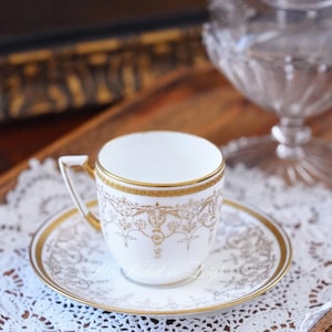 Antique Coalport White and Gold Demitasse