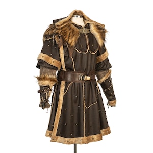 Barbarian Master 3-Piece Set – Perfect for Fighter, Warlock, and Assassin characters in LARP, Cosplay, and Ren Faire events. Includes: Faux Fur & Leather Waistcoat, Ornate Hood, and Faux Fur Vambraces with foam Throwing Dagger.