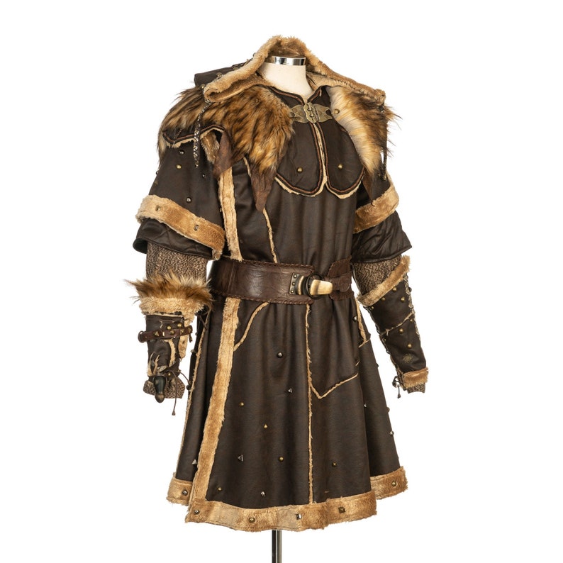 Barbarian Master 3-Piece Set – Perfect for Fighter, Warlock, and Assassin characters in LARP, Cosplay, and Ren Faire events. Includes: Faux Fur & Leather Waistcoat, Ornate Hood, and Faux Fur Vambraces with foam Throwing Dagger.