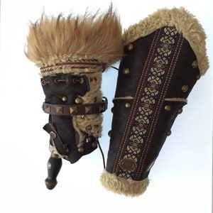 Barbarian Master 3-Piece Set – Perfect for Fighter, Warlock, and Assassin characters in LARP, Cosplay, and Ren Faire events. Includes: Faux Fur & Leather Waistcoat, Ornate Hood, and Faux Fur Vambraces with foam Throwing Dagger.