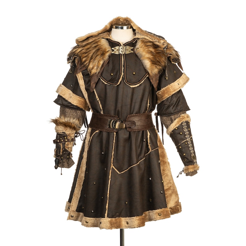 Barbarian Master 3-Piece Set – Perfect for Fighter, Warlock, and Assassin characters in LARP, Cosplay, and Ren Faire events. Includes: Faux Fur & Leather Waistcoat, Ornate Hood, and Faux Fur Vambraces with foam Throwing Dagger.