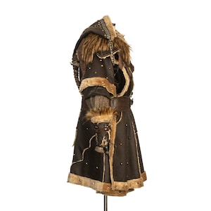 Barbarian Master 3-Piece Set – Perfect for Fighter, Warlock, and Assassin characters in LARP, Cosplay, and Ren Faire events. Includes: Faux Fur & Leather Waistcoat, Ornate Hood, and Faux Fur Vambraces with foam Throwing Dagger.