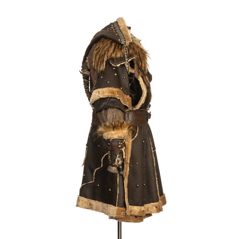 Barbarian Master 3-Piece Set – Perfect for Fighter, Warlock, and Assassin characters in LARP, Cosplay, and Ren Faire events. Includes: Faux Fur & Leather Waistcoat, Ornate Hood, and Faux Fur Vambraces with foam Throwing Dagger.
