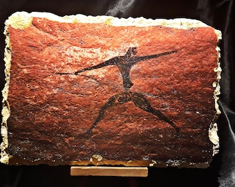 Man holding bow, algeria art, cave mural