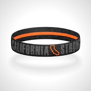 Pick Your State -  Blackout Thin Orange Line Strong Reversible Wristband Bracelet Shows Support for Search and Rescue Personnel