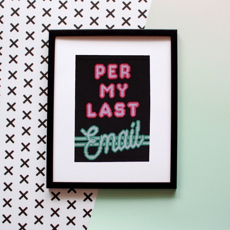 May include: A framed black and white cross-stitch design with the text "PER MY LAST Email" in pink and green neon lettering.