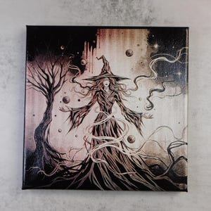 May include: Square canvas art featuring a witch with long flowing hair and a pointed hat. The artwork is in shades of brown, black, and white, with a tree on the left and swirling lines throughout. Spheres float around the witch.