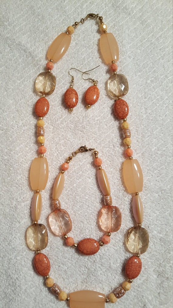Items similar to 3 Piece Necklace, Earrings, and Bracelet with Peach ...