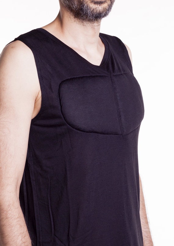 Black Sleeveless Padded Undershirt. T Shirt With Muscles. Fake