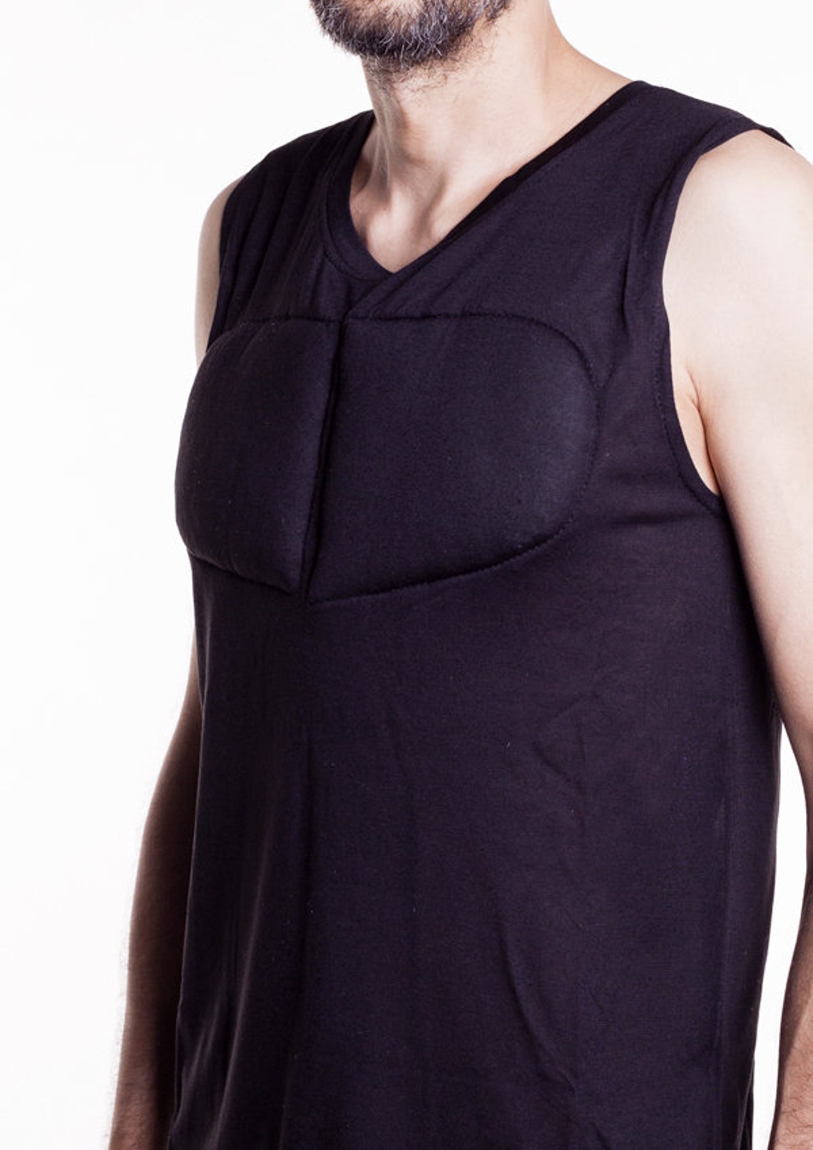 Black Sleeveless Padded Undershirt. T Shirt With Muscles. Fake Muscles