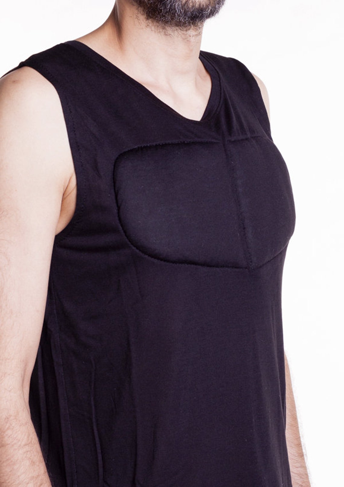 Black Sleeveless Padded Undershirt. T Shirt With Muscles. Fake Muscles