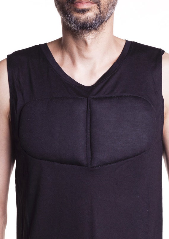 Black Sleeveless Padded Undershirt. T Shirt With Muscles. Fake