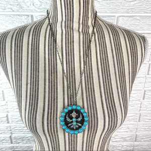 Vintage Faux Turquoise and Silver Tone Necklace Unique Figure Medallion