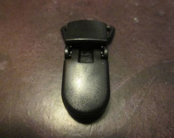 a strap clamp/ black plastic nipple fastener