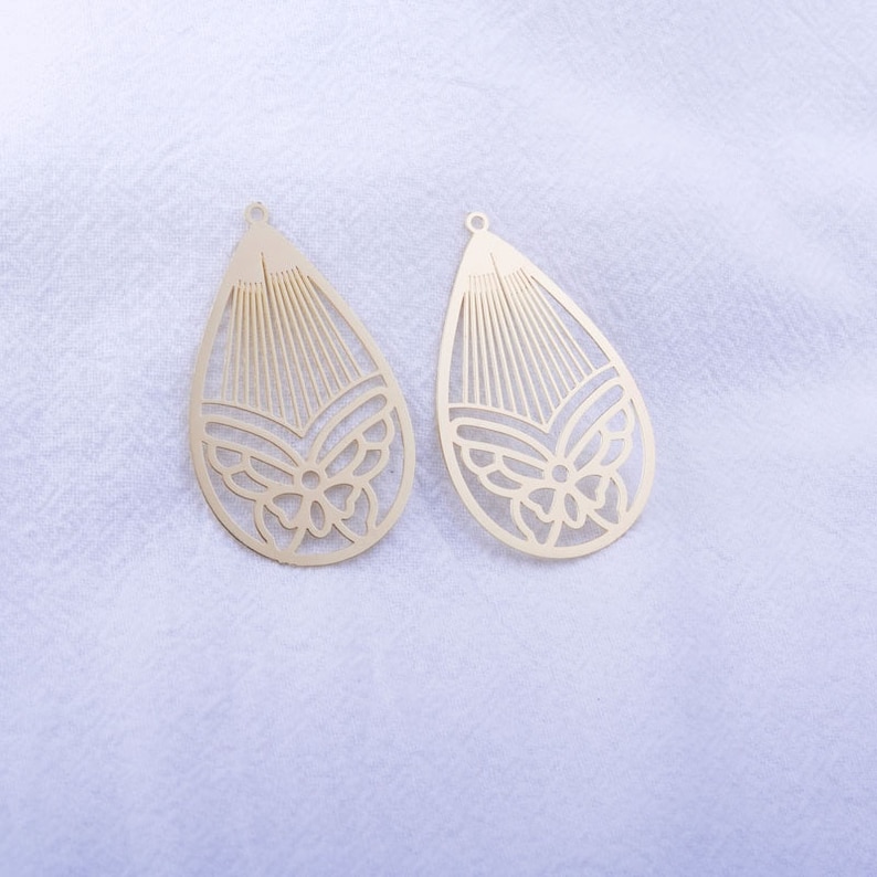 gold drop prints 2 gold watermark prints butterfly pattern 42 x 26 mm