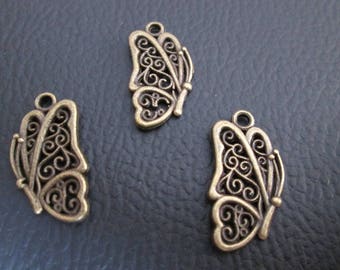 10 breloques papillons ajourés en métal bronze 22 x 12 mm