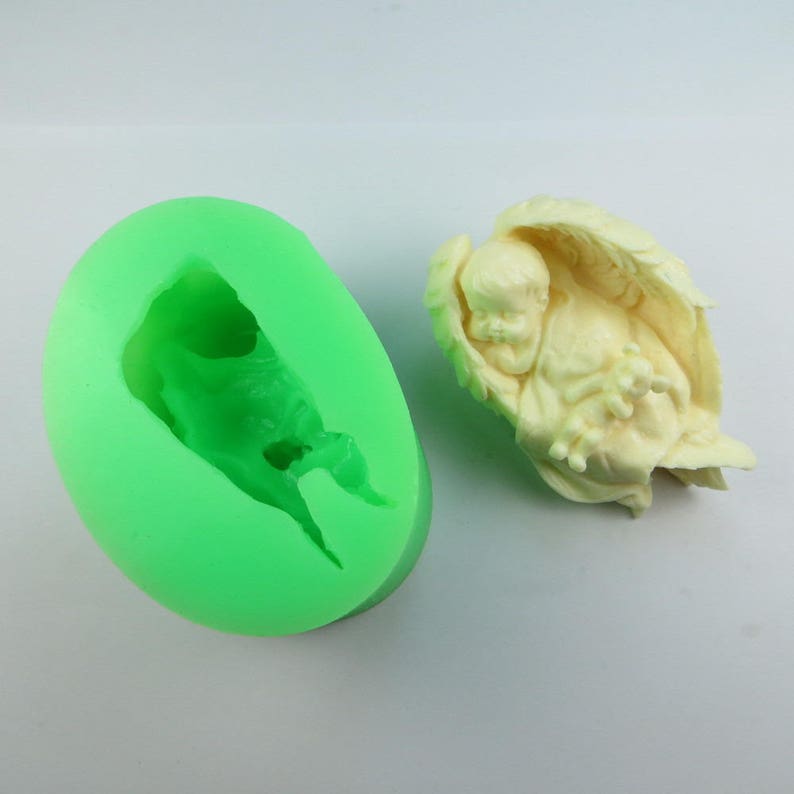 baby silicone mold and her teddy on Angel wings and