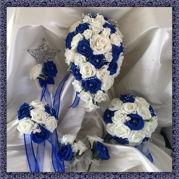 Royal Blue & Ivory wedding bouquets with butterflies, Brides, Bridesmaids, Flowergirls etc