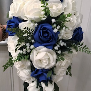 Gorgeous ivory and royal blue rose coloured roses Brides wedding  bouquet