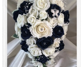Wedding Flowers Navy Blue & Ivory wedding bouquets with butterflies, Brides, Bridesmaids, Flowergirls etc