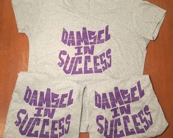 Damsel in Success Women’s V-Neck Tee Shirt