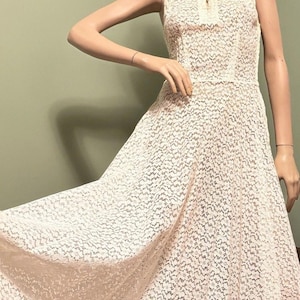 cream lace fit and flare dress Cream Floral Lace Puff Sleeve Ruffle Hem Mini Dress
