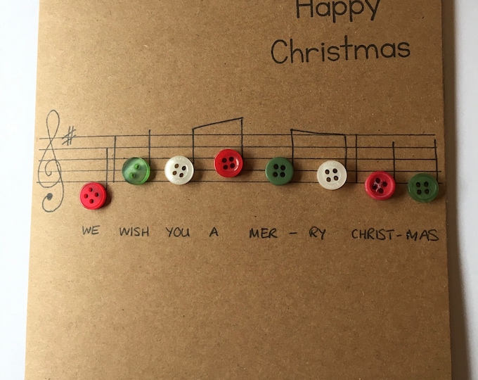 We wish you a merry Christmas . Handmade card with button music notes.